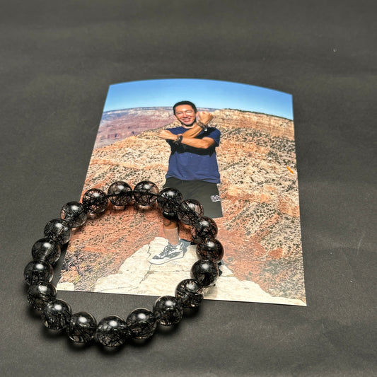 【049】＜C＞7Aブラックルチルクォーツブレス 内径約16cm ルース約10mm ＊会長シール付き【live限定】live20251031