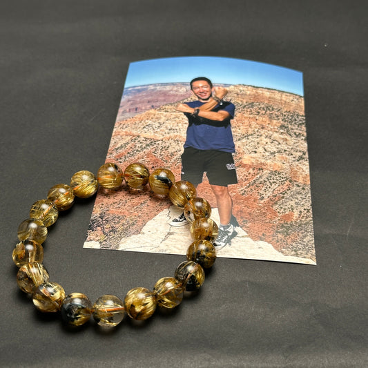 【050】＜C＞7A太陽放射ルチルクォーツブレス 内径約16.5-17cm ルース約11mm ＊会長シール付き【live限定】live20251031